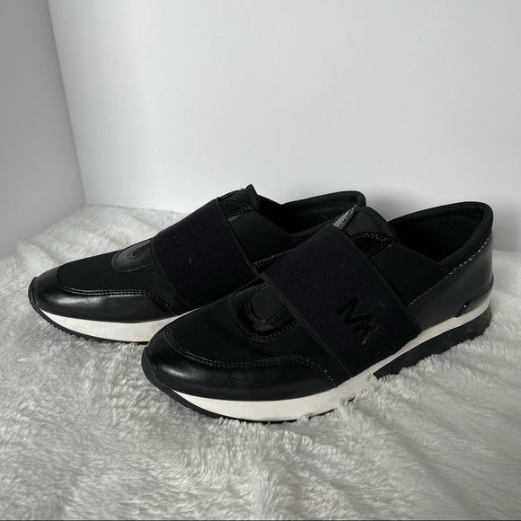 Michael Kors Shoes - EUC Michael Kors Black Slip on Sneakers sz 8.5